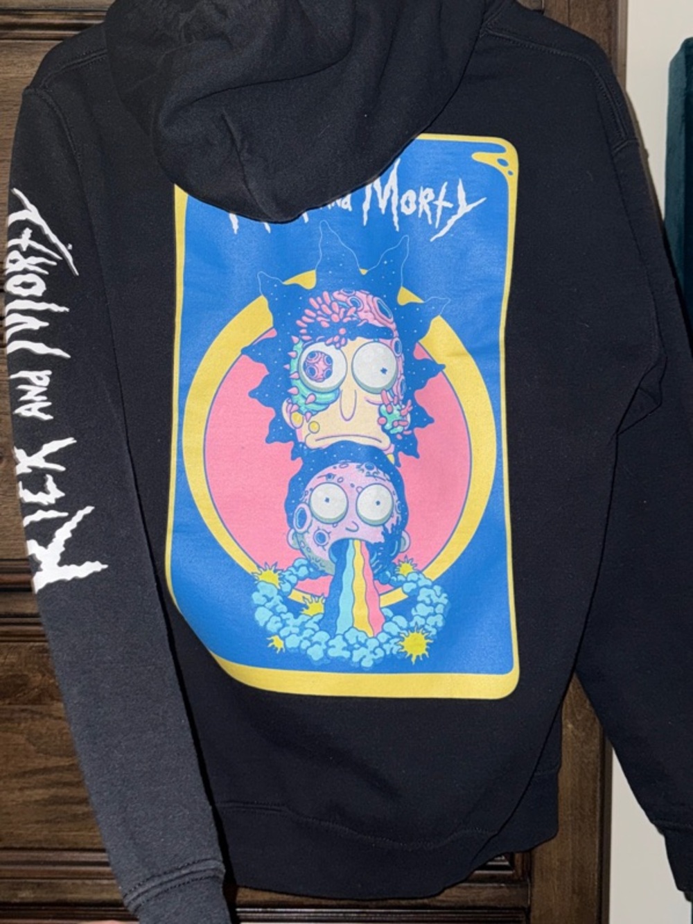 Rick and Morty Black Pullover Hoodie with Vibrant Back Graphic
